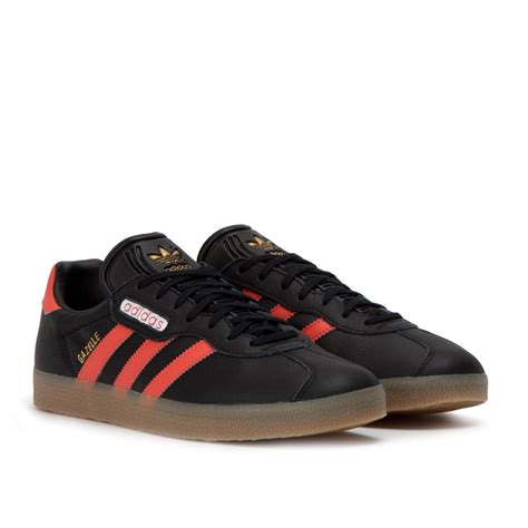 adidas gazelle schwarz rot gold|adidas gazelle sandals.